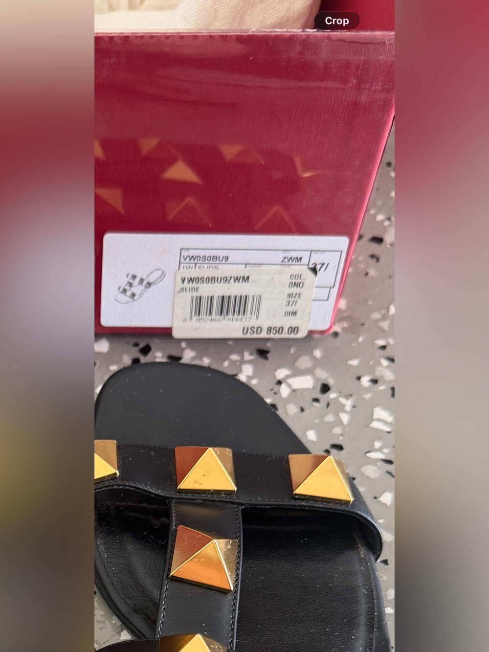 Valentino Garavani Black Leather Slide Sandals with Gold Studs